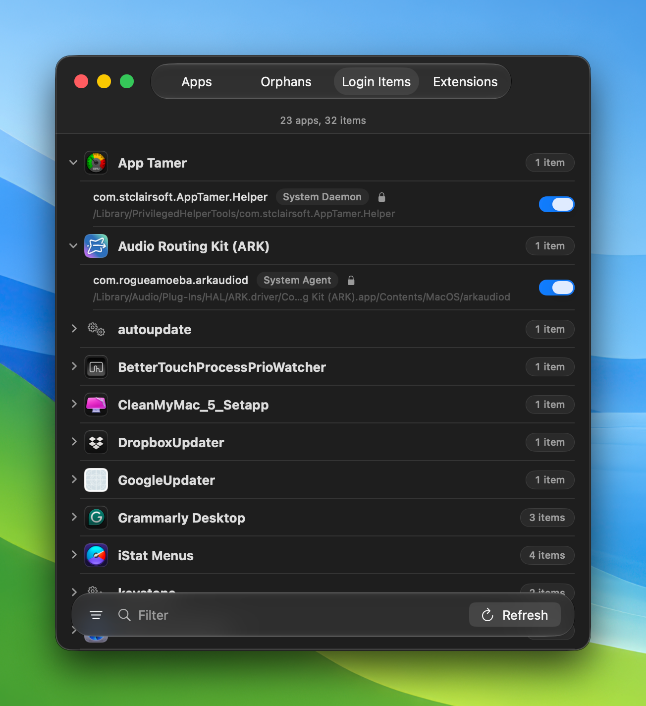 Sweeper's login items list grouped by app